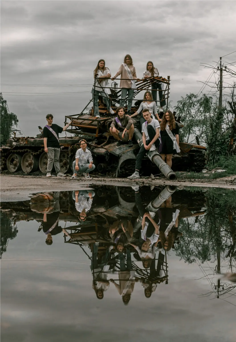 High school students pose in front of a destroyed military vehicle for a graduation photo in Ukraine’s war-torn

Chernihiv on June 5, 2022.
Credit: Stanislav Senyk @senykstas (on Instagram)
