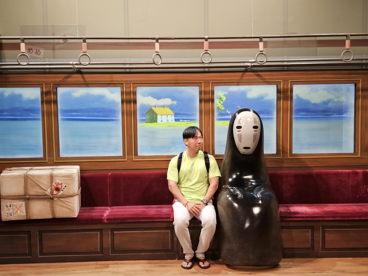 Mr. Liu and No Face at a Studio Ghibli exhibition in Bangkok, Thailand in 2023.