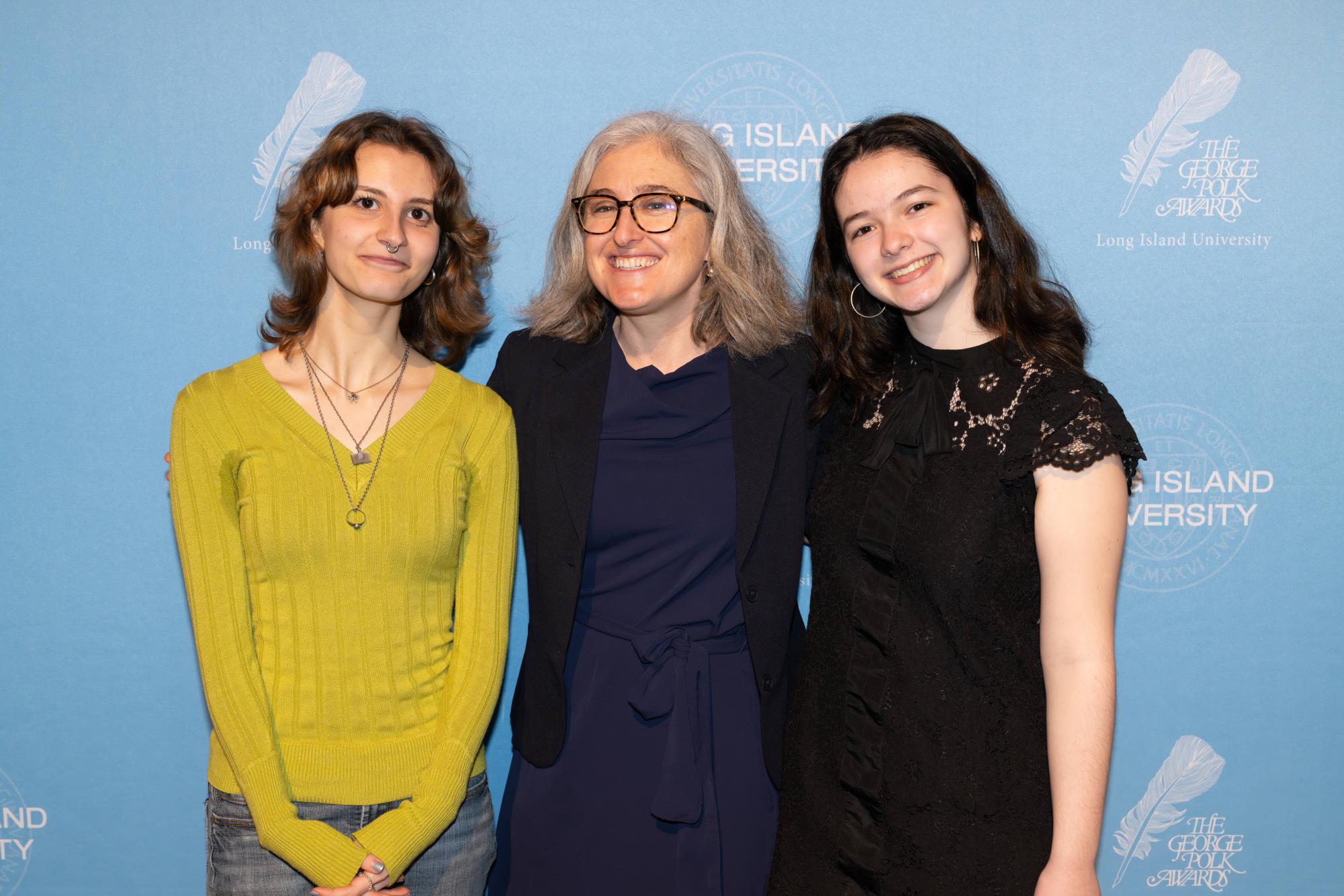 Eli, Ms. Hesseltine, and Esther at the Polk awards ceremony on April 10.