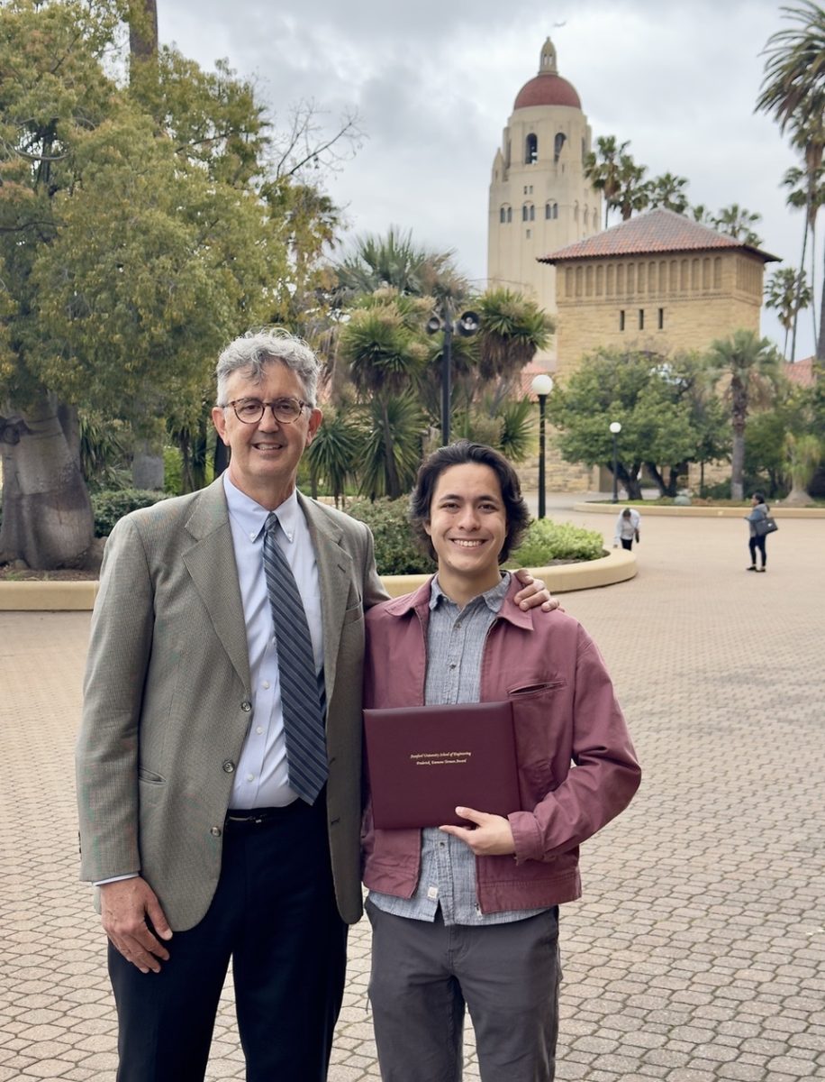 Mr. Henning and Ethan Katz pose with the Frederick Terman award.
